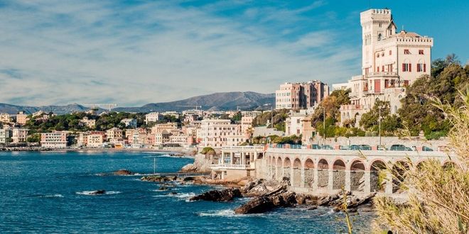 Panoramic view of Genoa, in Italy, with its traditional buildings facing the blue sea