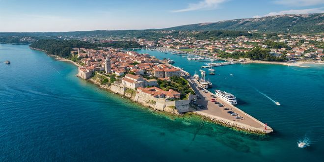 The historic old town peninsula and harbor of Rab in Croatia