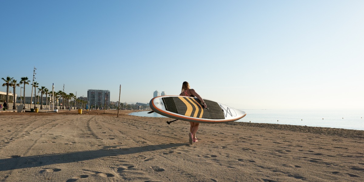 Surfing at the beach of Barcelona