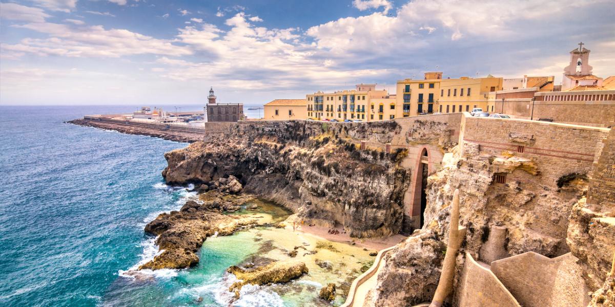 melilla, coast, rocky beach, buildings, road