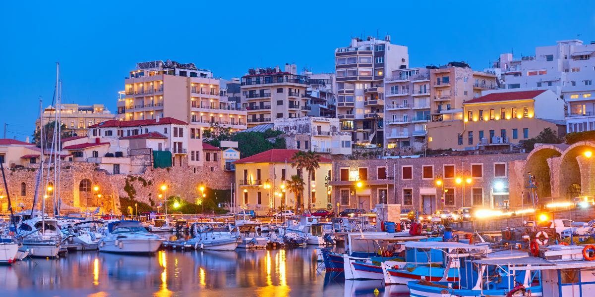 The illuminated port of Heraklion in the evening