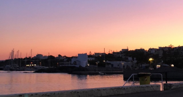 Sunset over the port of Syros, Greece