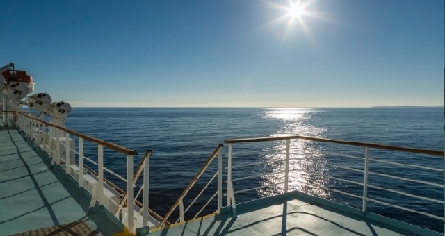 The warm sun shining on the deck of the ferry to Mallorca