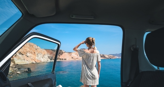 Car by the beach in Milos