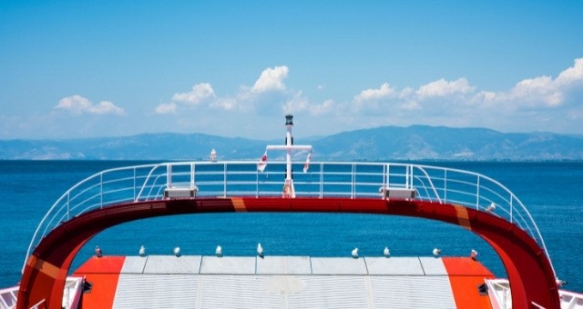 View to the Aegean Sea over a ferry hatchway in Greece