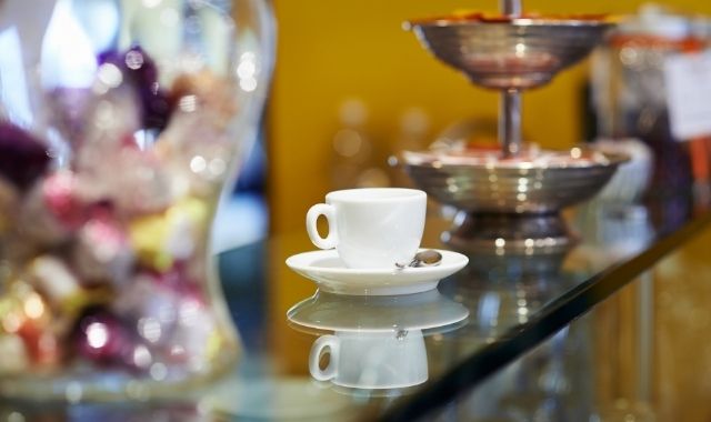 Espresso cups on the bar of a cafe in Italy