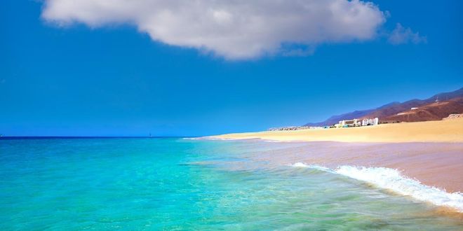 Long sandy stretch at the nude-friendly beach of Matorral in Fuerteventurea, Spain