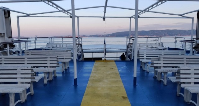 The deck of a Greek ferry at the sunset