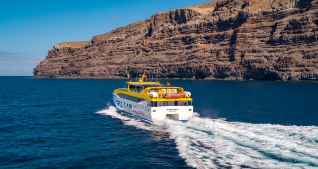 Fred. Olsen Express’ ferry Benchi Express traveling by the coast of La Gomera, Spain