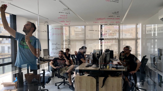 Ferryhopper team members having a remote meeting in the office