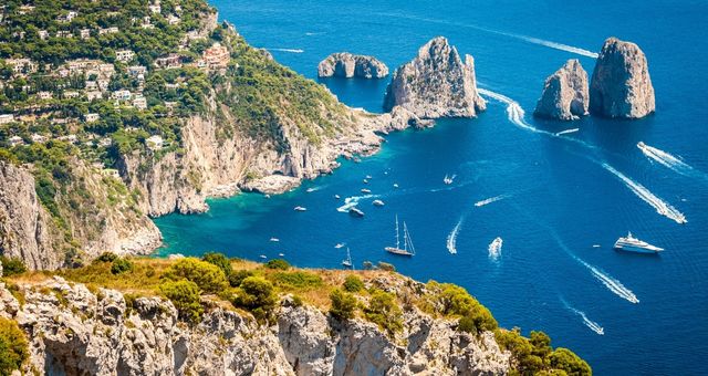 The coast of Capri and the Faraglioni Rocks