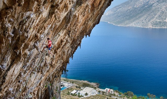 Climbing a cliff in Nisyros, Greece