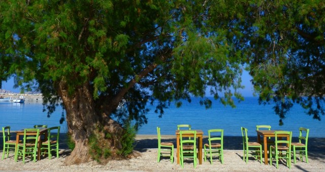 Chairs and tables by the Aegiali beach in Amorgos