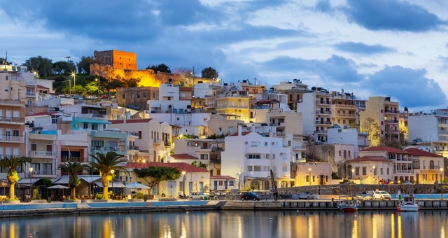 Buildings and street-lights in Heraklion, the capital city of Crete, at sundown