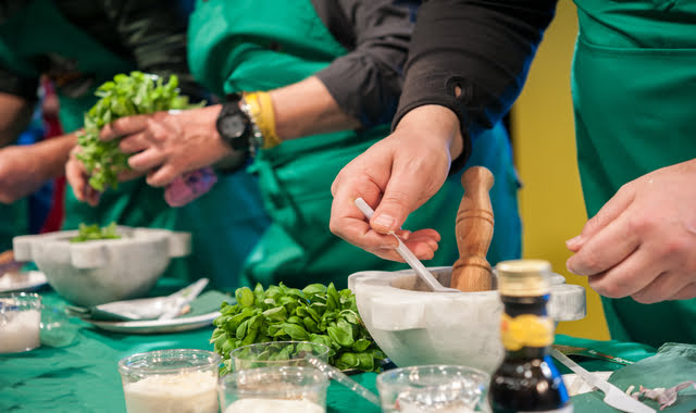 Preparation of Genoese pesto during the Basil Night in Celle Ligure, Italy