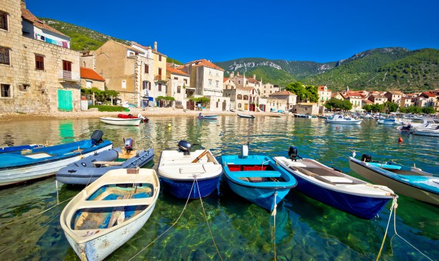 Small fishing boats at a beach in Komiza village, Vis