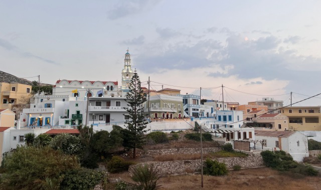 View of the tall bell tower of the Ypapanti Church in Arkasa, Karpathos, Greece