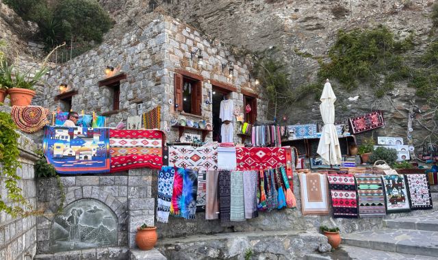 A colorful shop in Olympos hidden in the mountain, Karpathos, Greece