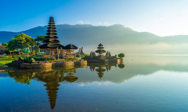 Morning view of Ulun Danu Temple and reflection on Bratan Lake in Bali, Indonesia
