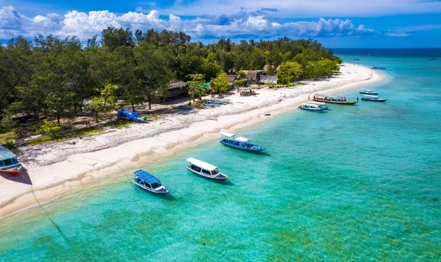 Aerial view of boat moored near Lombok beach