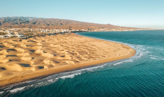 Aerial of Maspalomas dunes and beach in Gran Canaria, Canary Islands, Spain