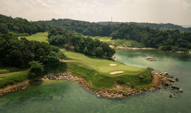 Aerial view of golf course and lagoon in Bintan, Indonesia