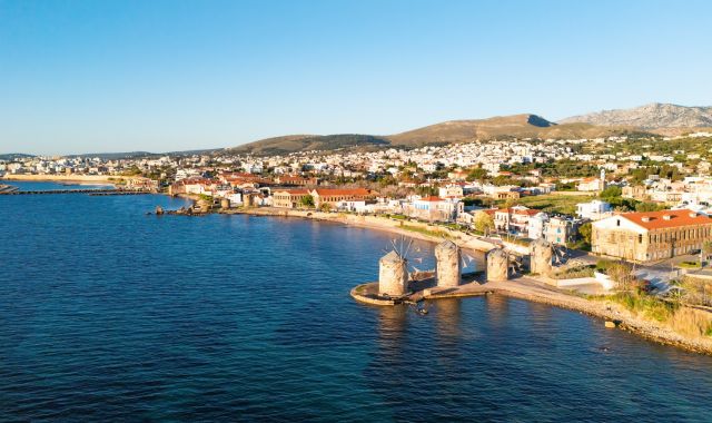 View of ancient mills on the seafront in Chios, Greece