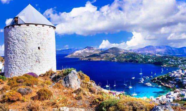 View of windmill and Agia Marina village in Leros, Dodecanese, Greece