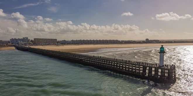 View of Calais and its beach from ferry departing to Dover, English Channel