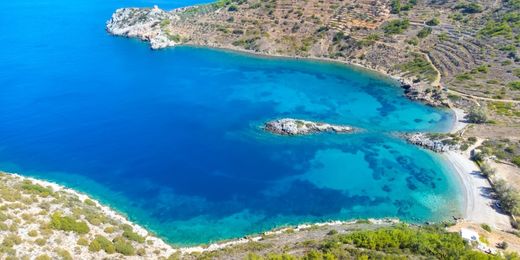 View of Didima Beach on the Greek island of Chios from above, surrounded by blue seas and hills