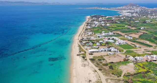 The long coast of Plaka beach in Naxos island, Cyclades, Greece
