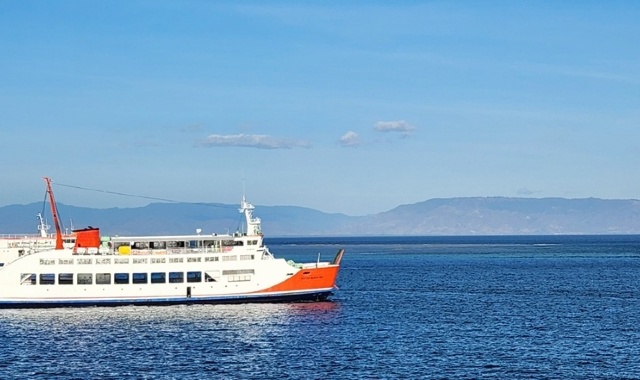 Ferry at sea traveling across the Strait of Lombok 