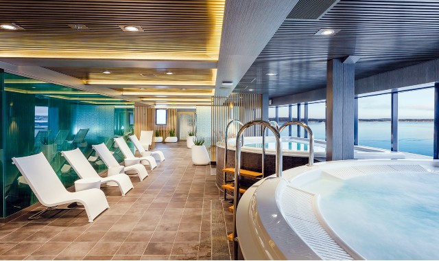 Spa area on the Viking Grace ferry with lounge chairs and large windows