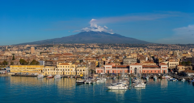 The port of Catania and mount Etna in the background, Sicily, Italy