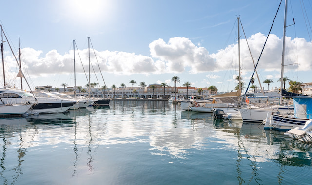 A marina filled with yachts and sailboats in La Savina, Formentera, Spain