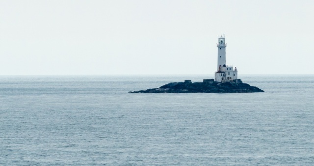 The lighthouse of Rosslare surrounded my the sea