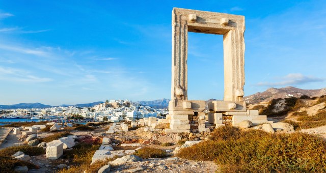 The ancient Portara marble gate overlooking the town of Naxos, Greece