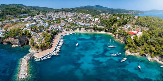 Panoramic view of a Votsi port in a blue bay in Alonissos, Greece