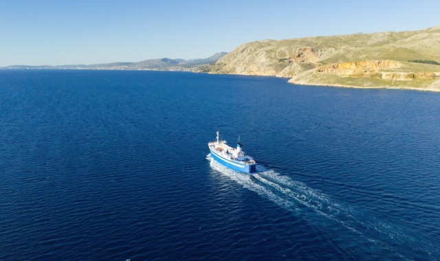 Panoramic view of ferry crossing the sea in Greece