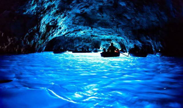 View of boats in the Blue Grotto, Capri, Italy