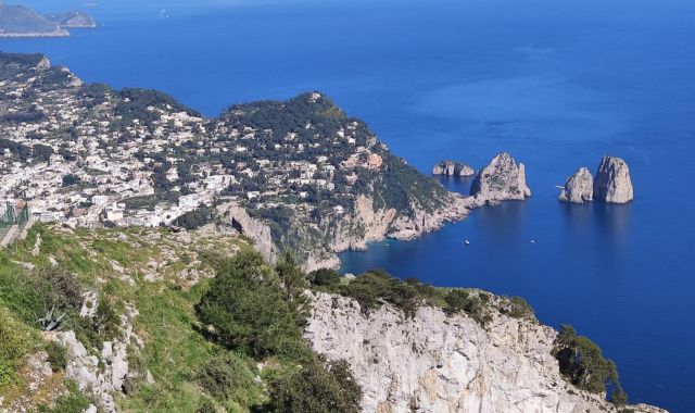 Panoramic view of Faraglioni rocks in Capri, Italy
