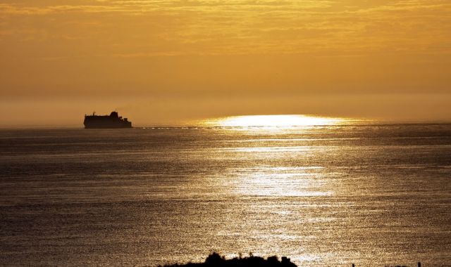 Sunset view of ferry crossing the Irish Sea