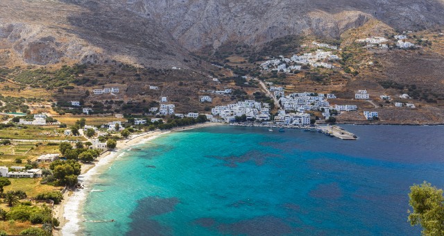 afternoon in Amorgos, beach near the town, white houses, mountain, ferry trips