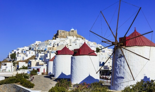 White windmills at the entrance of the Astypalea Chora