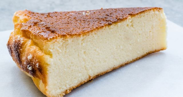 A generous slice of fiadone, the typical lemon and cheese dessert from Corsica