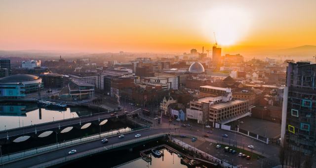 Beltast's modern buildings at sunrise, in the UK