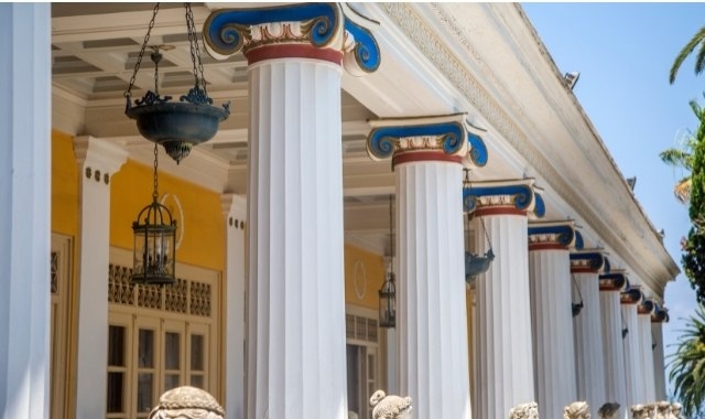 Columns with colored capitals at the Achilleion Palace in Corfu, Greece