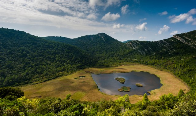 Aerial view of Blatina lake within a field in Mljet, Croatia