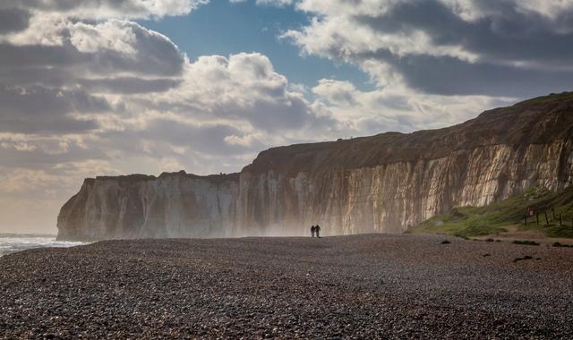 Cloudy day over Newhaven's rocky cliffs