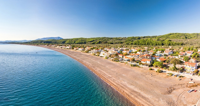 Houses on the long beach of Agia Anna, northern Evia